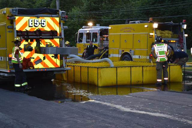 Tanker Shuttle Training - Dump Site.  Engine 5-5 dumping to the porta-tanks.  Engine 5-3 pumping to the scene.
